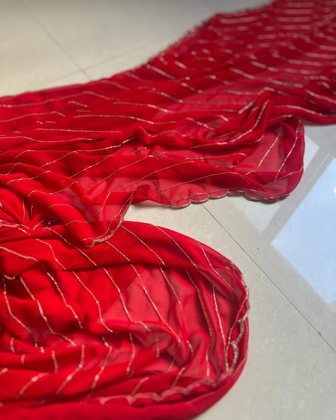 pure red georgette saree with handwork