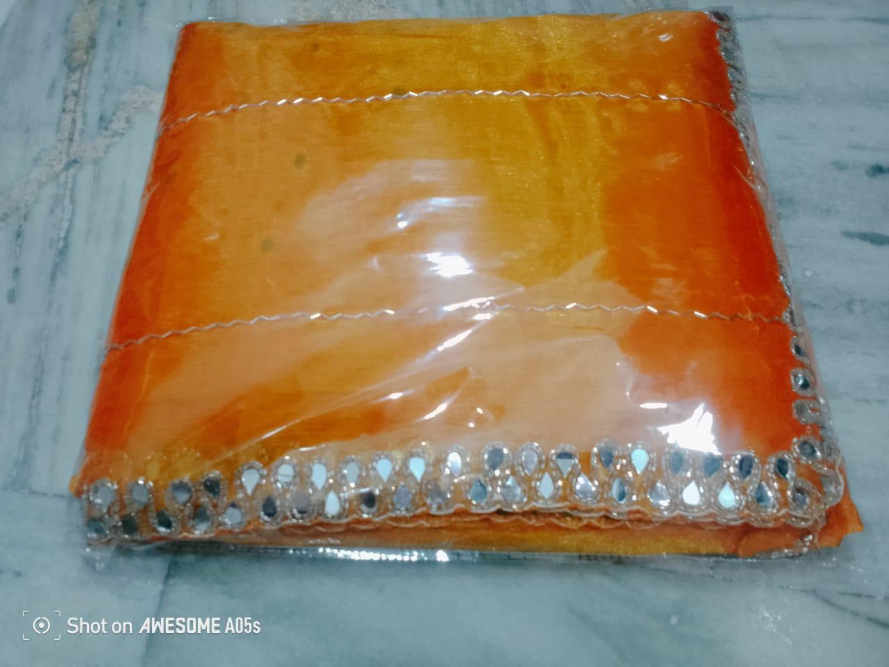 Jimmy Choo mirror handwork