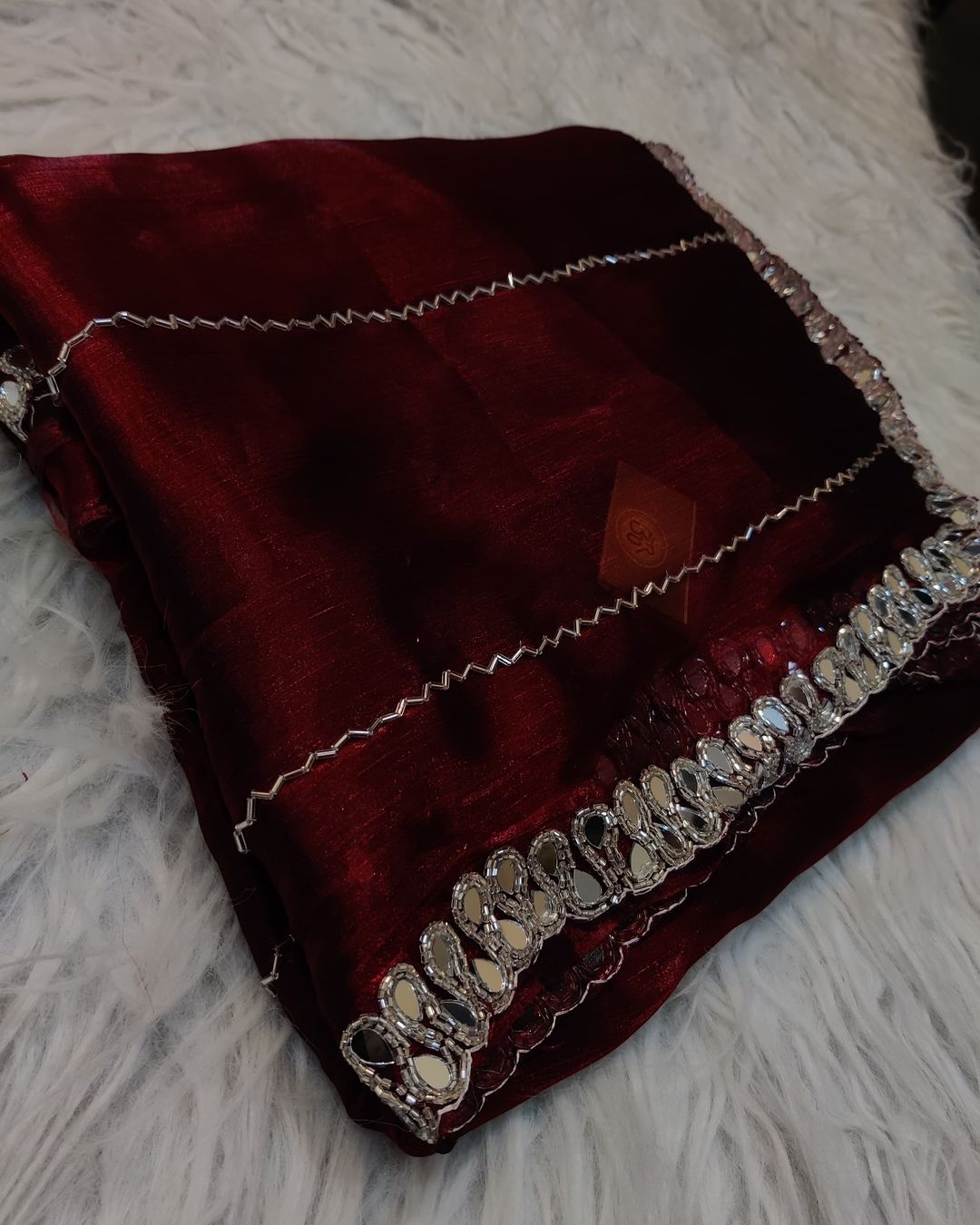 Jimmy Choo mirror handwork