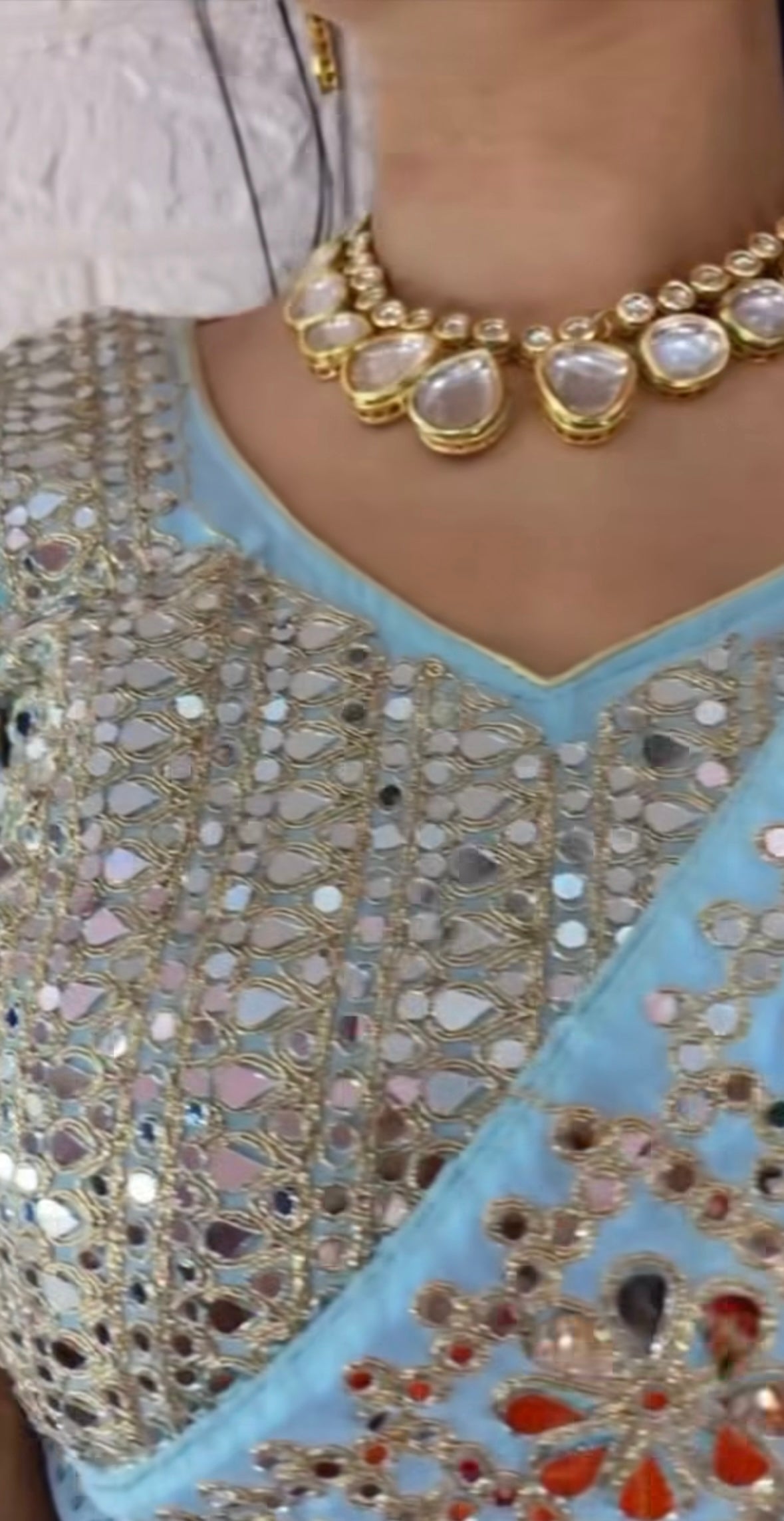 Sky blue mirror work saree with heavy mirror work on blouse