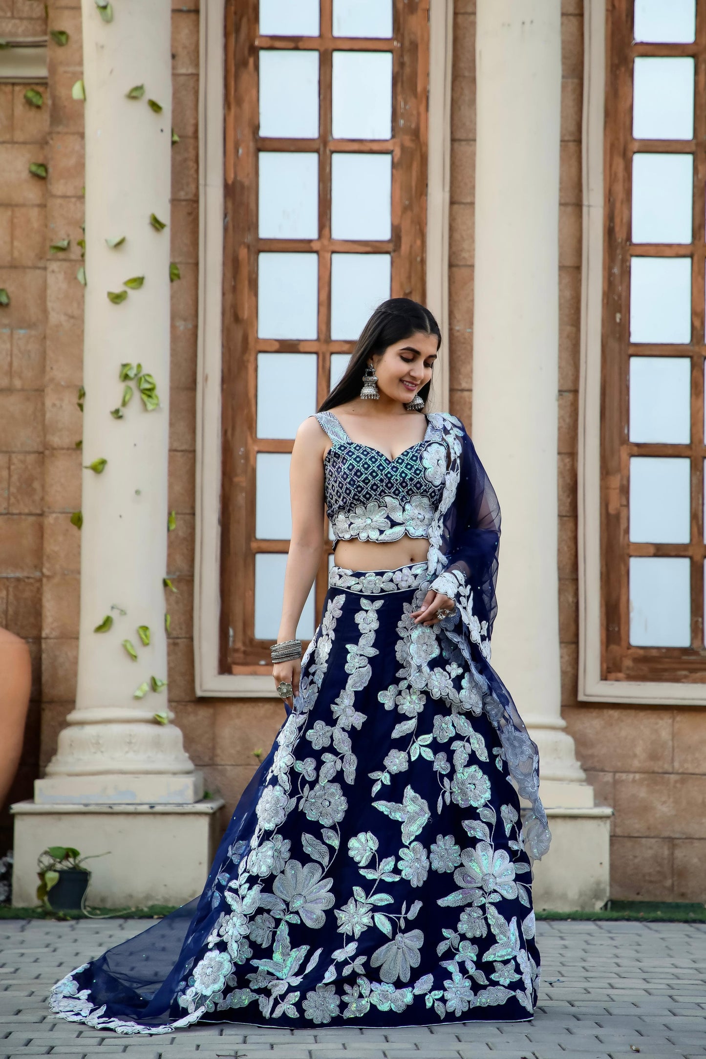 Kasturi Silk georgette lehenga with rainbow sequins & Dori work