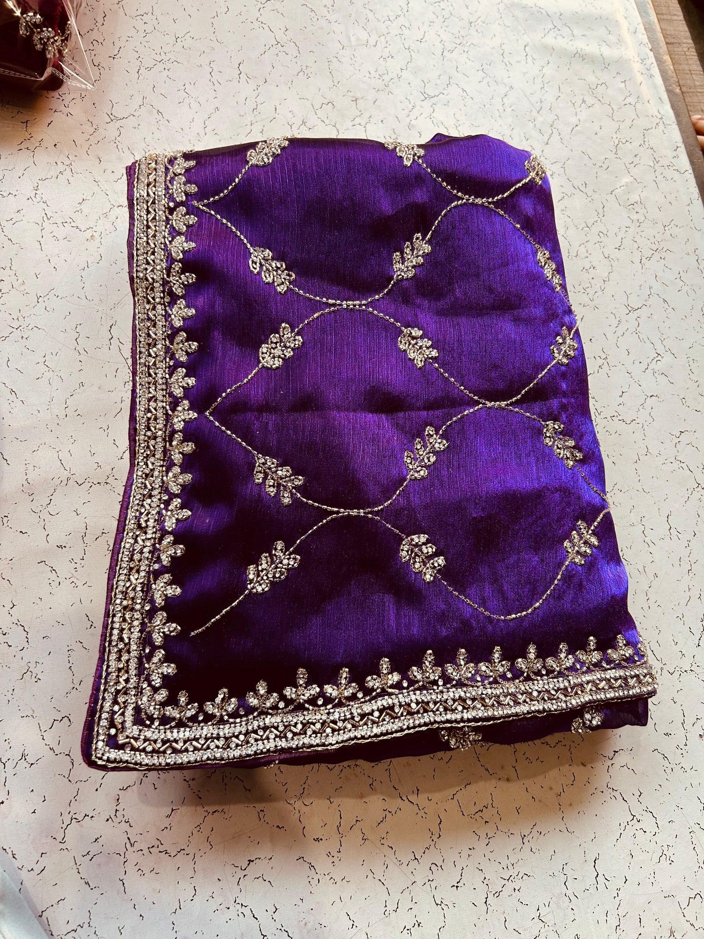 Jimmy Choo jaal design with diamond stone handwork