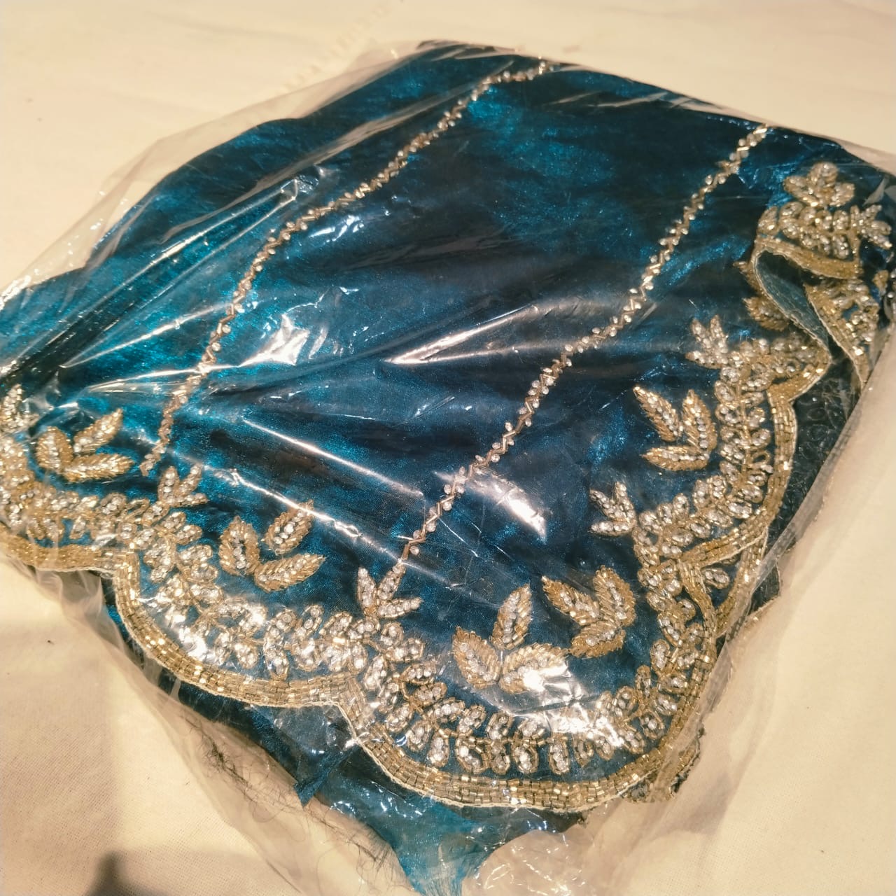 Fendi saree in diya design with diamond stone handwork