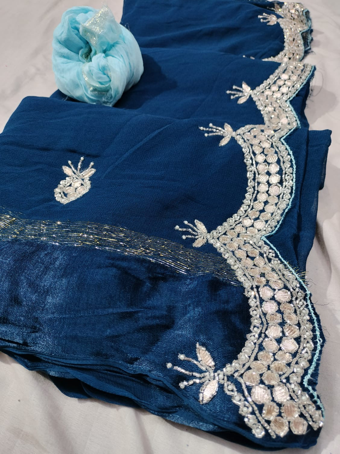 Pure Georgette sattan fabric saree
Goldan jari