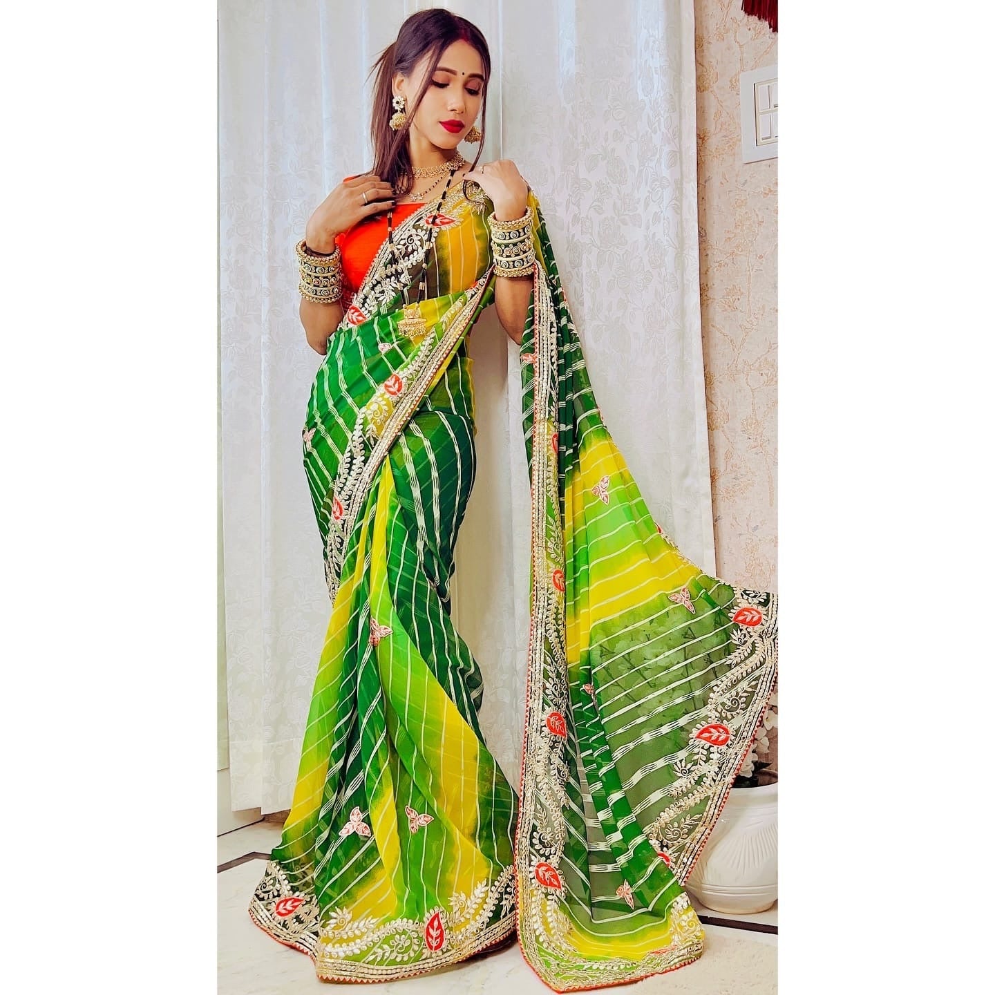 Lehriya saree with all over heavy gota