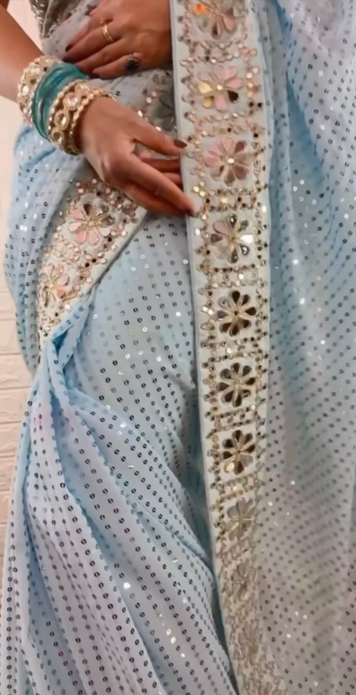 Sky blue mirror work saree with heavy mirror work on blouse