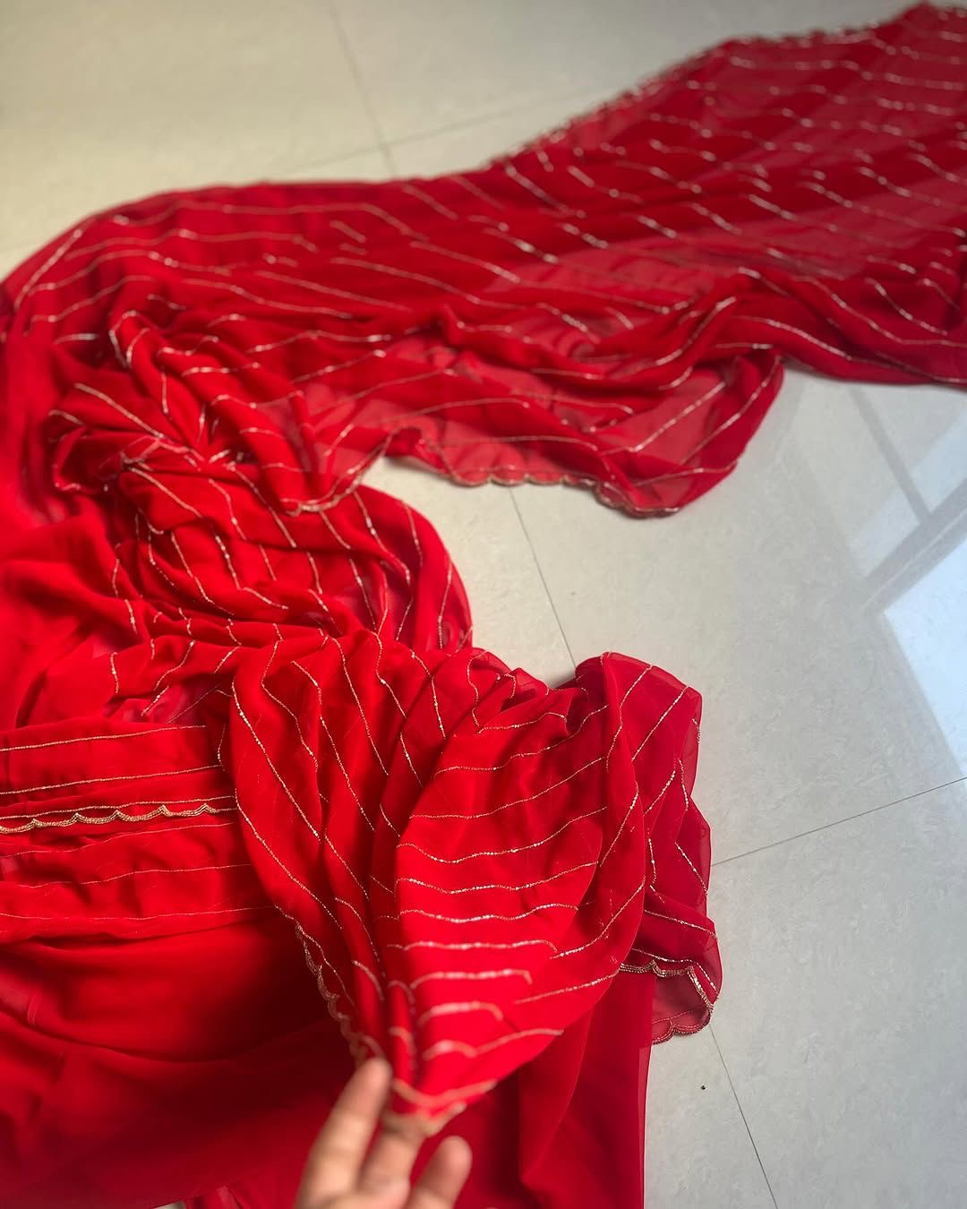 pure red georgette saree with handwork