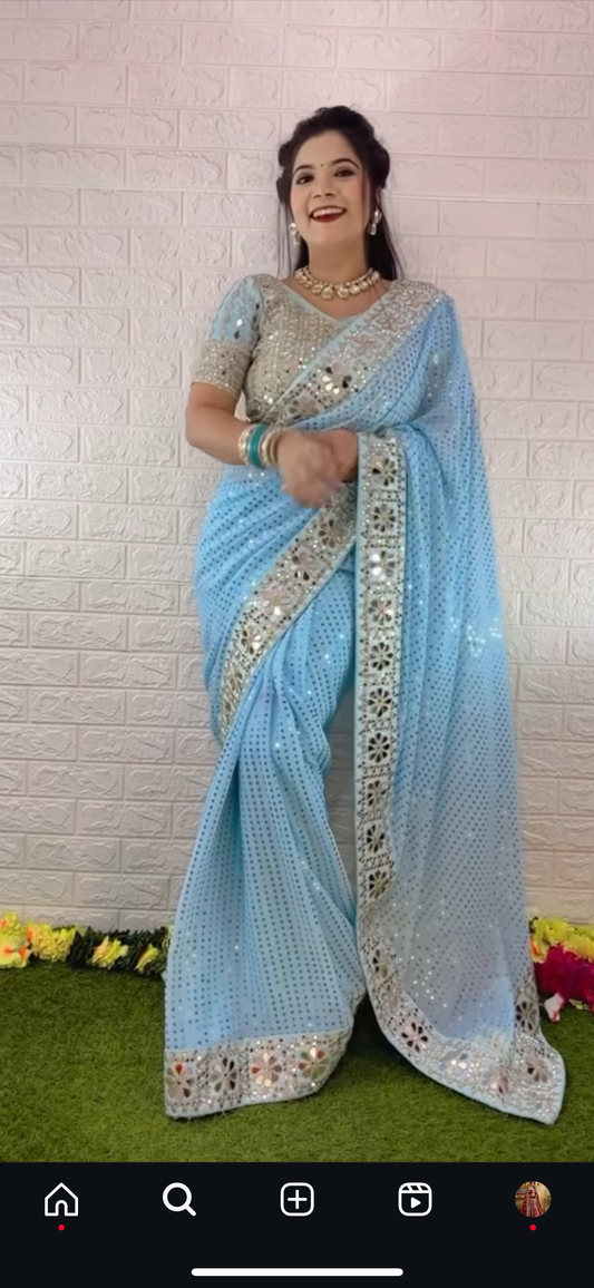 Sky blue mirror work saree with heavy mirror work on blouse