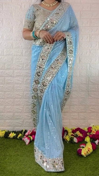 Sky blue mirror work saree with heavy mirror work on blouse