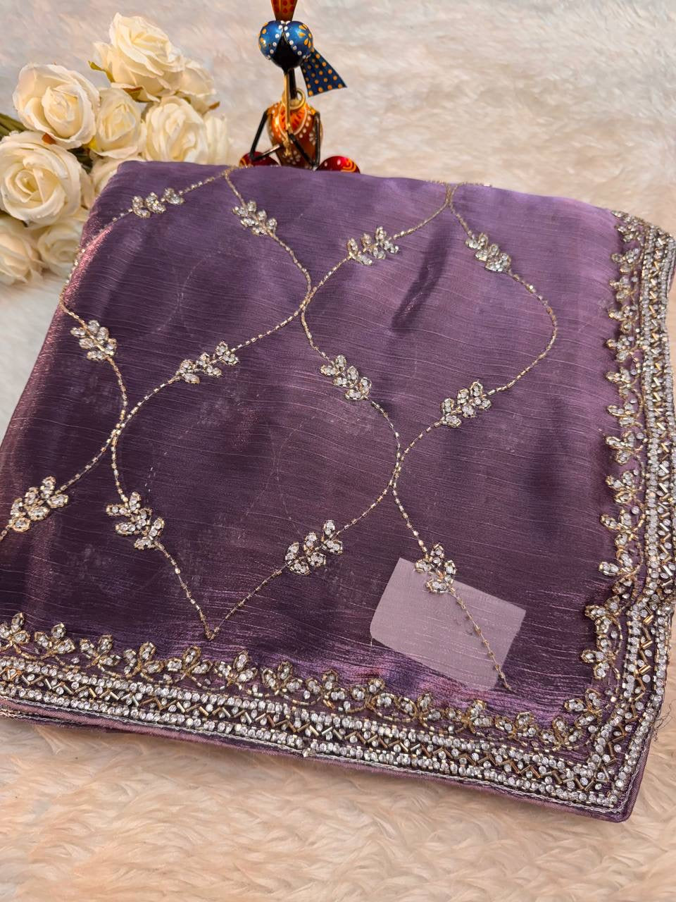 Jimmy Choo jaal design with diamond stone handwork