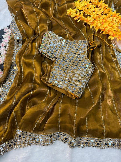 Soft satin Organza saree which is embedded with real mirror work