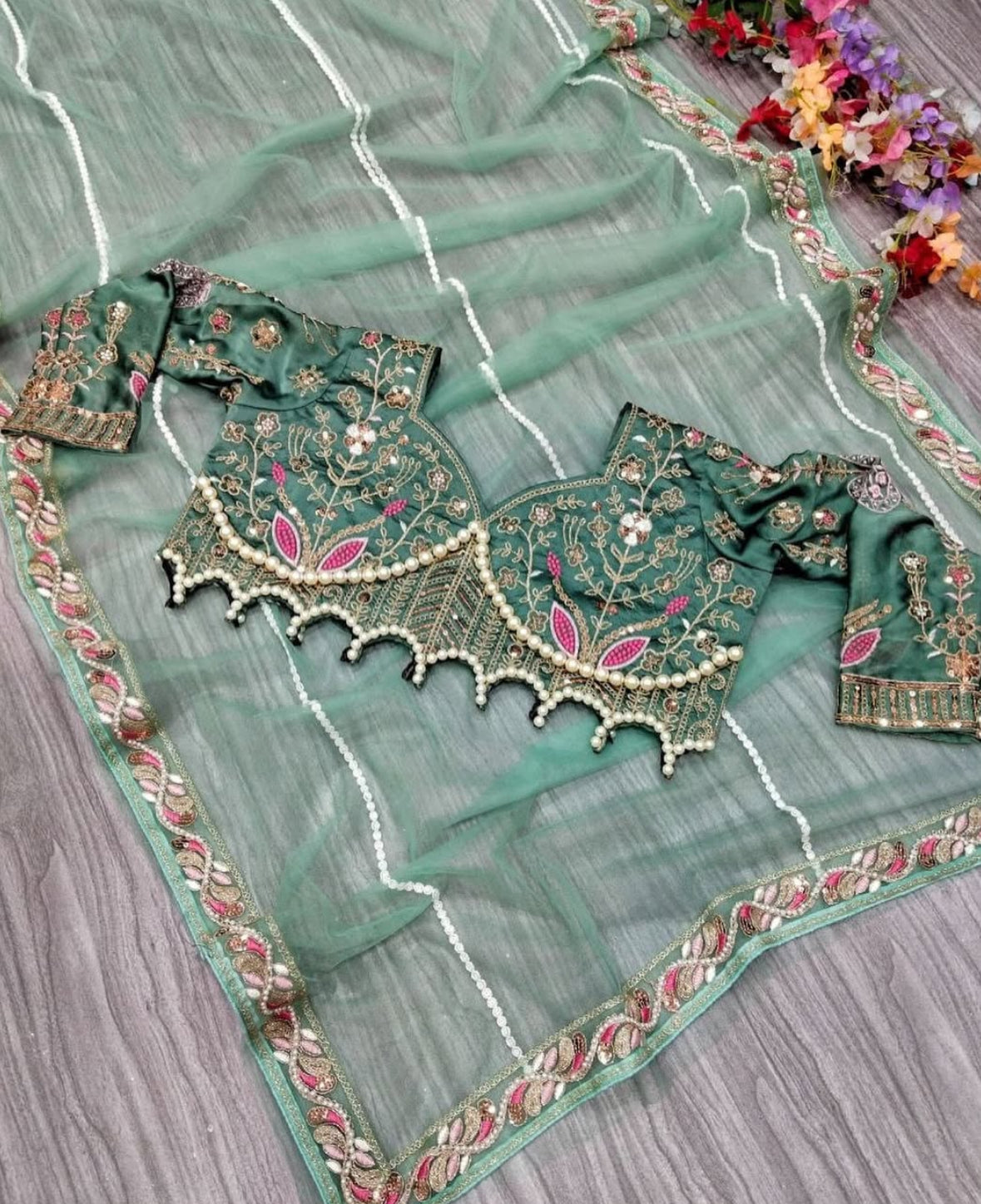 Premium Net Embellished With Beautiful Embroidery,Dori And Sequins