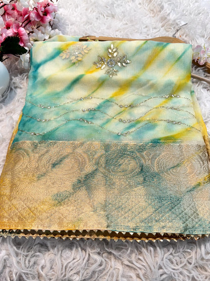 Organza saree with diamond stone handwork