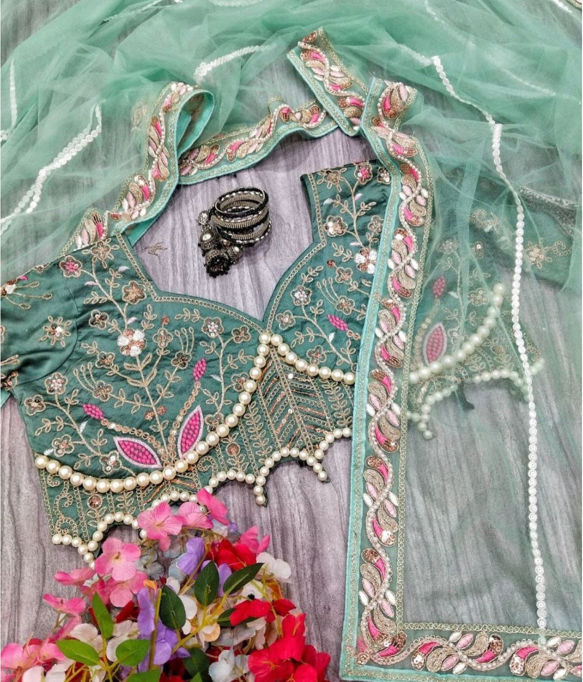 Premium Net Embellished With Beautiful Embroidery,Dori And Sequins