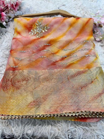 Organza saree with diamond stone handwork